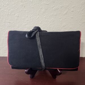 Yves Saint Laurent Black and Red Travel Jewelry Pouch.